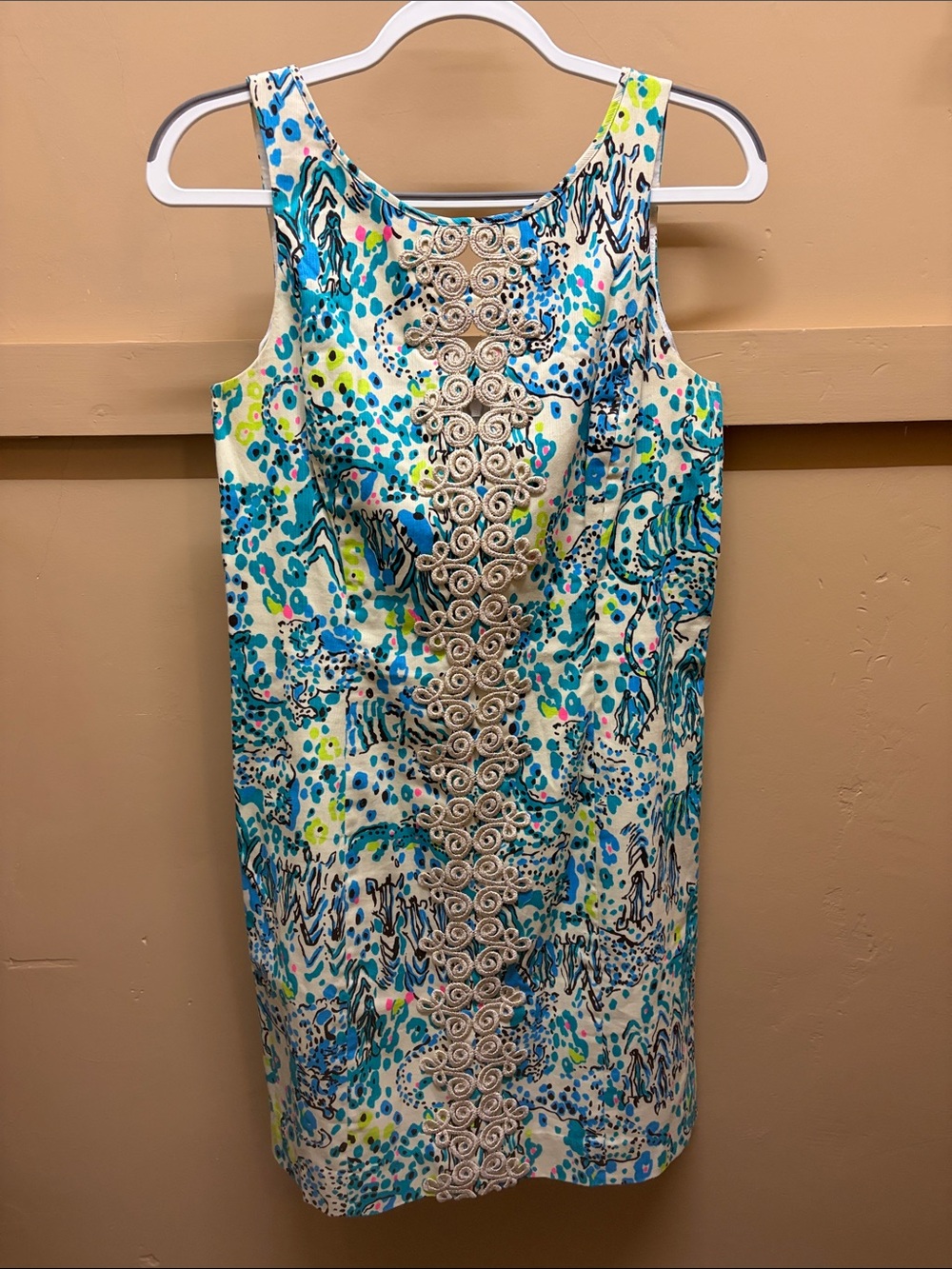 Sleeveless Blue & White Printed Shift Dress with Center Embellishment
